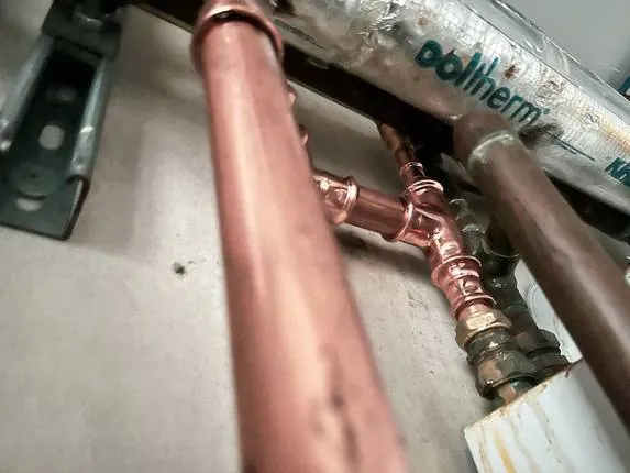 Soldered copper tee on a new run