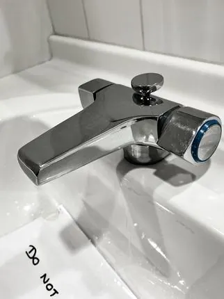 New mixer tap fitted on the sink